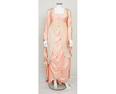 A 1960s theatrical costume consisting of a peach silk and cream georgette dress with matching silk cloak designed by Marty Fl