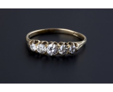 A diamond five stone ring, set with graduated brilliant and old-cut diamonds, to shank stamped '18', ring size R