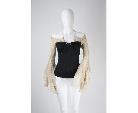An Alexander McQueen sheer polka dot blouse, with tie neckline, Alexander McQueen label to neck, two Alexander McQueen black 