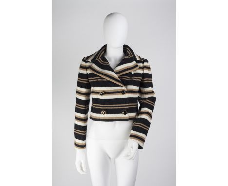 A Bernard Perris cream and black striped double breasted jacket with large collar and full length sleeves with statement butt
