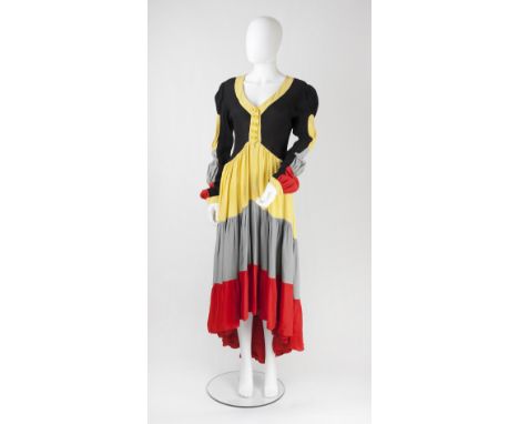 A 1970s Ossie Clark traffic light dress, the black crepe bodice button fronted, to flounced graduated skirt in yellow, grey a