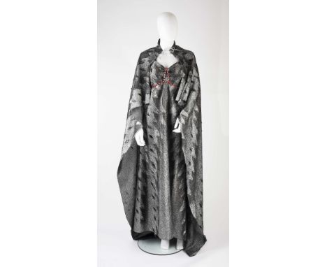 A full length silver and black lame dress and cloak from the 1980 film Flash Gordon worn by the character 'Hawkwoman', with f