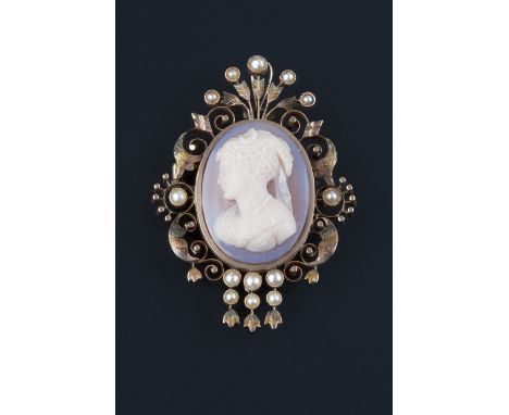 A hardstone cameo brooch/pendant, the oval hardstone cameo carved to depict a female portrait profile, to scroll pierced fram