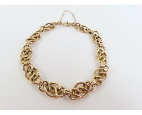 A 9ct gold Celtic type link bracelet, 20cm long, 9.5g gross