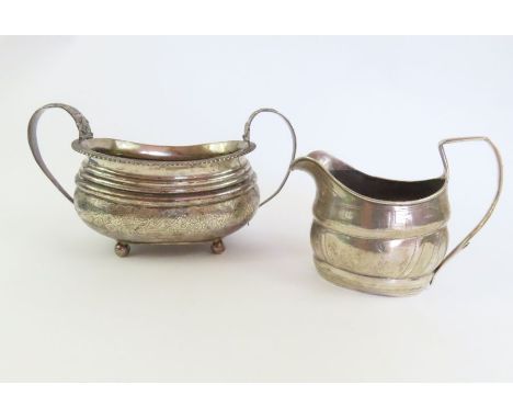 A Georgian silver two handled sucrier, London, 1818. Solomon Royes &amp; John East Dix, with foliate decoration; and an Irish