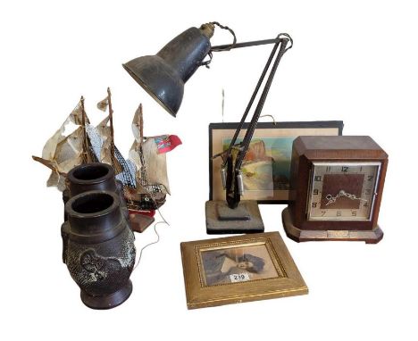 A black painted metal angle poise lamp, a presentation mantel clock; small framed portrait of a lady and other items