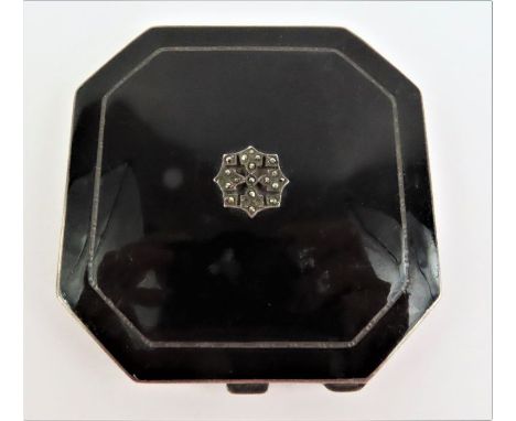 An Art Deco silver compact, Birmingham, 1936, Hamilton &amp; Inches, of square form with cantered corners and decorated with 