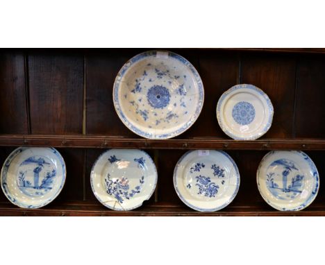 An English Delft Side Plate, circa 1780, painted in blue with a formal foliate roundel, 19.5cm diameter; A Pair of Shallow Ci