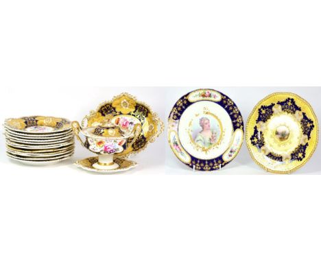 An English Porcelain Dessert Service, possibly Spode, circa 1830, painted and gilt with flowersprays on a blue and cream grou