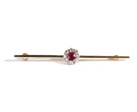 A Ruby and Diamond Bar Brooch, a round cut ruby within a border of old cut diamonds, to a knife edge bar, total estimated dia