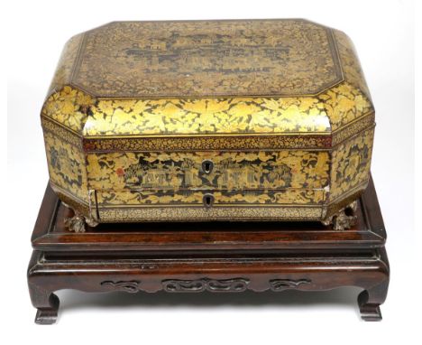 A Chinese Export Lacquer Sewing Box, 19th century, of canted rectangular form, painted and gilt with figures in landscapes wi