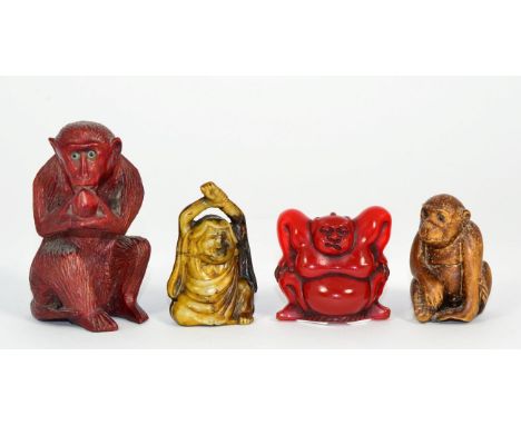 A Japanese Amber Netsuke, early 20th century, modelled as a sumo wrestler, 4.5cm high; and Three Other Netsukes (4)