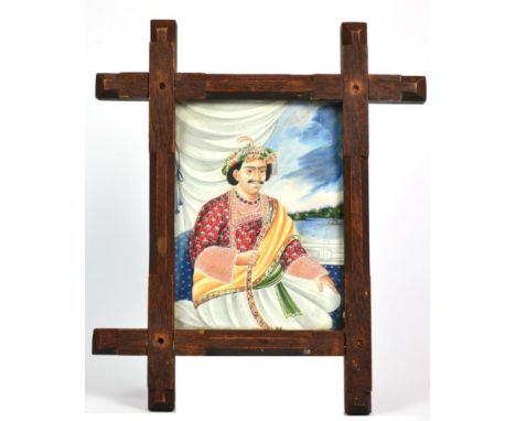 An Indian Reverse Painting on Glass, late 19th century, painted with a portrait of Shah Soujan, 14.5cm by 10.5cm