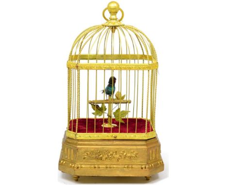 A Singing Bird in a Cage Automaton, 20th century, domed gilt metal bird cage, single bird with green and turquoise feathers, 