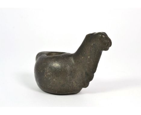 A Stone Votive Container or Canopa, probably Inca, 15th century, modelled as a stylised llama, 10.5cm long