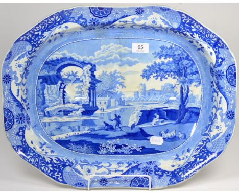 A Spode Pearlware Meat Platter, circa 1820, with tree and well, printed in underglaze blue with the Italian pattern, impresse