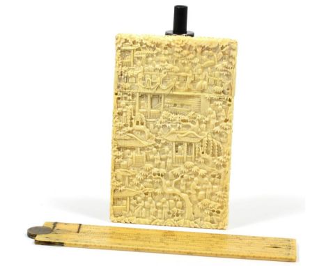 A Cantonese Ivory Card Case, circa 1870, of rectangular form, typically carved with figures and buildings amongst trees, 12cm