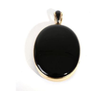 A Victorian Onyx and Black Enamel Mourning Locket Pendant, each half inset with an oval onyx plaque, to a black enamel bail, 