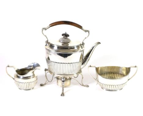 A Victorian Silver Three Piece Tea Service, Francis Boone Thomas, London 1884, comprising kettle on stand with burner, twin h