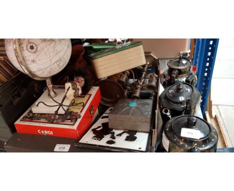 A box of miscellaneous items including 3 teapots, vintage metal sandwich tin, candelabra, Brownie camera, small globe, repro 