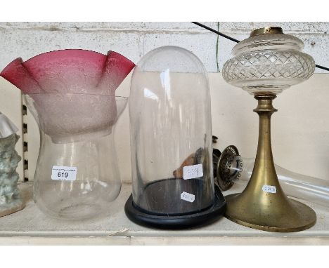 Glass vase, glass dome on base and an oil lamp with coloured shadeCondition:- cranberry glass shade has General wear, large c
