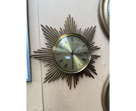 A junghans ato-mat sunburst clock