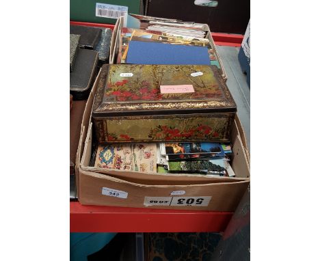 Two boxes and a tin of vintage postcards, mostly 1960s and 1970s including travel and churches. 