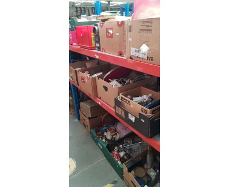 Sixteen boxes of miscellaneous items to include ceramics, glass, soft toys. sewing machine by Elna, toys including Pelham Pup