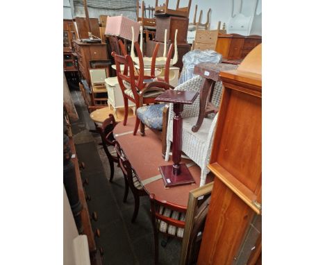 A quantity of furniture comprising a table and chairs, a wicker chair, an Art Deco style chair, a plant stand, a carved stool