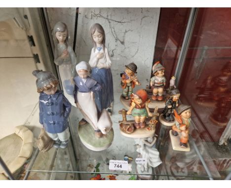 A group of 5 Hummell, 3 Nao &amp; 1 Royal Copenhagen figures. 