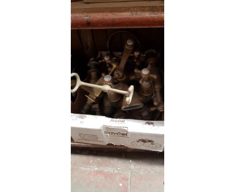 A box of vintage brass tap fittings 