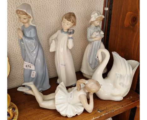 A group of five Nao figures. 