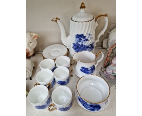 Spode blue and white coffee set with landscape scenes and the coffee pot scene titled: 'Two Heads Are Better Than One' 