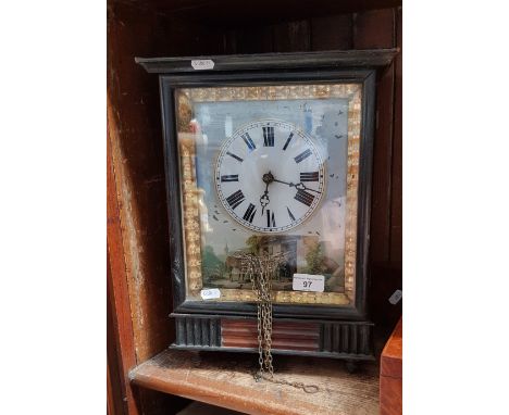 A 19th century German wall clock with painted enamel face - no weights 