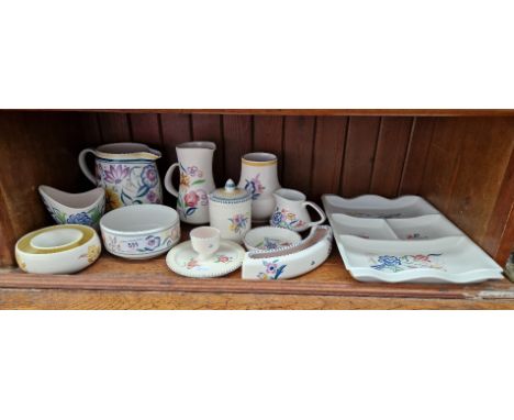 12 items of Poole pottery 