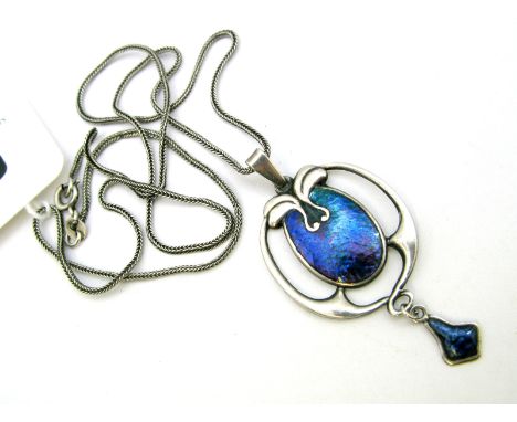 Charles Horner; A Chester hallmarked Silver and Enamel Pendant, of openwork design, highlighted in purple/blue, on a chain. 