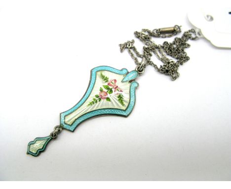 A Hallmarked Silver And Enamel Pendant, of shaped design, detailed with a rose below tied bow, on white ground, within turquo