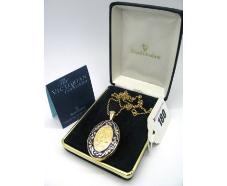 A Royal Doulton "The Victorian Collection" 14ct Gold Oval Locket Pendant, highlighted in enamel, on diamond set bale, on a 14