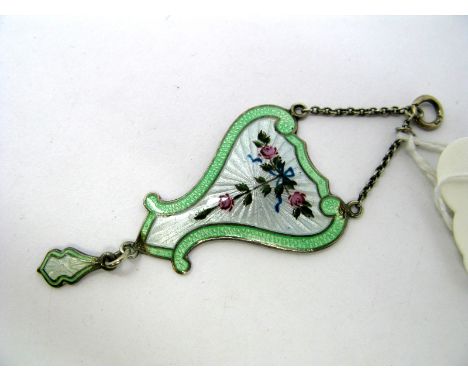 A Hallmarked Silver and Enamel Pendant, of shaped design, detailed with roses on a white ground, within mint green border, on