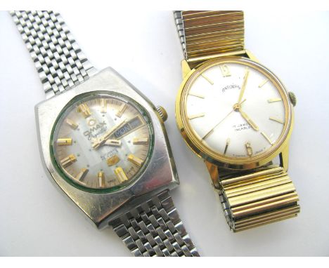 Omax Crystal; A Vintage Automatic Gent's Wristwatch, the signed dial with block markers and day/date aperture, within tonneau