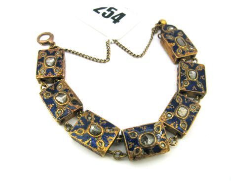 An Indian Enamel and Diamond Set Bracelet, composed of seven rectangular panels, each diamond set to the front, highlighted i