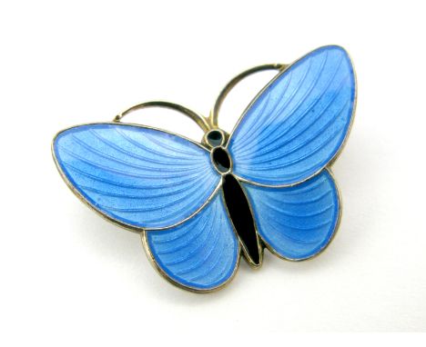 Aksel Holmsen; A Norwegian Enamel Butterfly Brooch, highlighted in black and blue, stamped "Norway Sterling" "925S". 