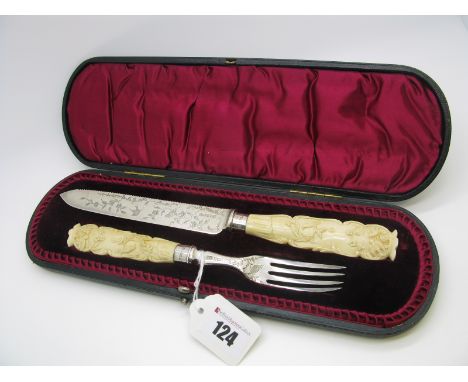 A Highly Decorative Hallmarked Silver Serving Knife and Fork, HA, Sheffield 1898 (one ferrule 1897), detailed with birds amon