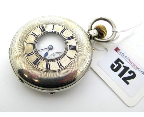 A Hallmarked Silver Cased Half Hunter Pocketwatch, the white dial with black Roman numerals, within engine turned case, Chest