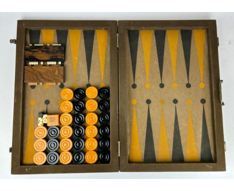 AN ART DECO BACKGAMMON SET, cased 72cm x 54cm when open **Please note this lot will be available for collection at an offsite