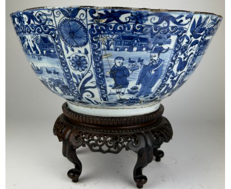 A CHINESE BLUE AND WHITE KRAAK PORCELAIN BOWL LATE MING DYNASTY CHONGZHEN PERIOD (1627-1644), The interior painted with a cen