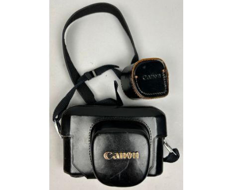 A CANON MODEL 7 RANGEFINDER CAMERA WITH CANON 50MM F 1.8 LENS, in original black leather makers case. Good condition and good