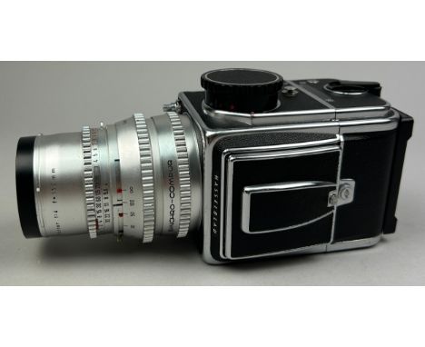 A 1981 HASSELBLAD 500 C/M Camera with SONNAR 150 mm Lens and A.12 back.Full working order and in very good condition. 