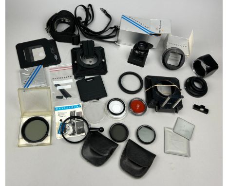 A VERY LARGE COLLECTION OF HASSELBLAD ACCESSORIES TO INCLUDE: H/B Magnifying Finder Hood 52094 in original boxH/B Extension T