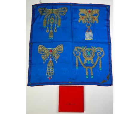 A MUST DE CARTIER PARIS SILK SCARF IN ORIGINAL PACKAGING, apparently unused 